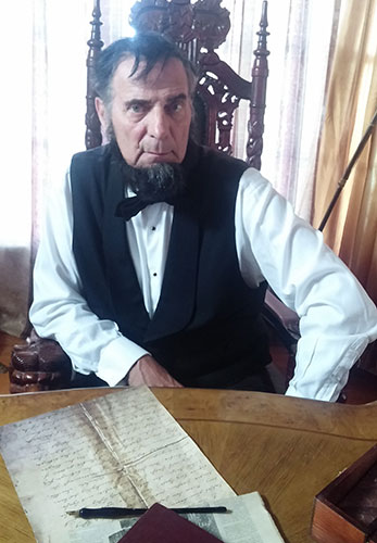 lincoln at desk